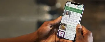 person reading stakeholder connect on mobile phone.