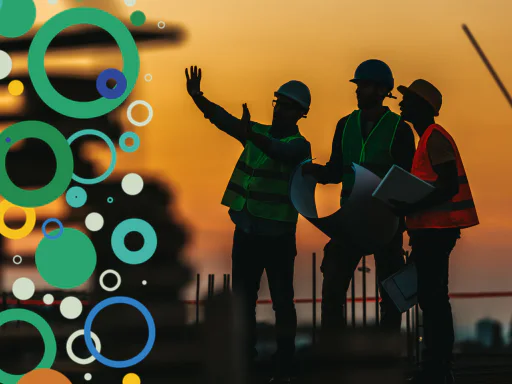 construction workers looking at plans with mental health commission branding added to the left side.
