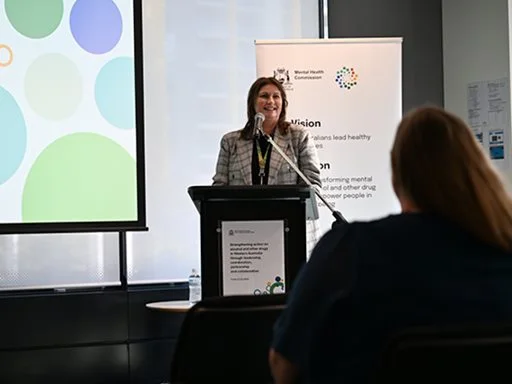 The Mental Health Commission Commissioner speaking at an event.