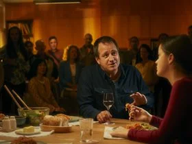 A dad and daughter at the dinner table, an image form the Alcohol. Think Again 'We all need to say no' campaign.